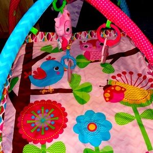 Baby floor mat used once it’s a bright starts good for kids to lay and play on